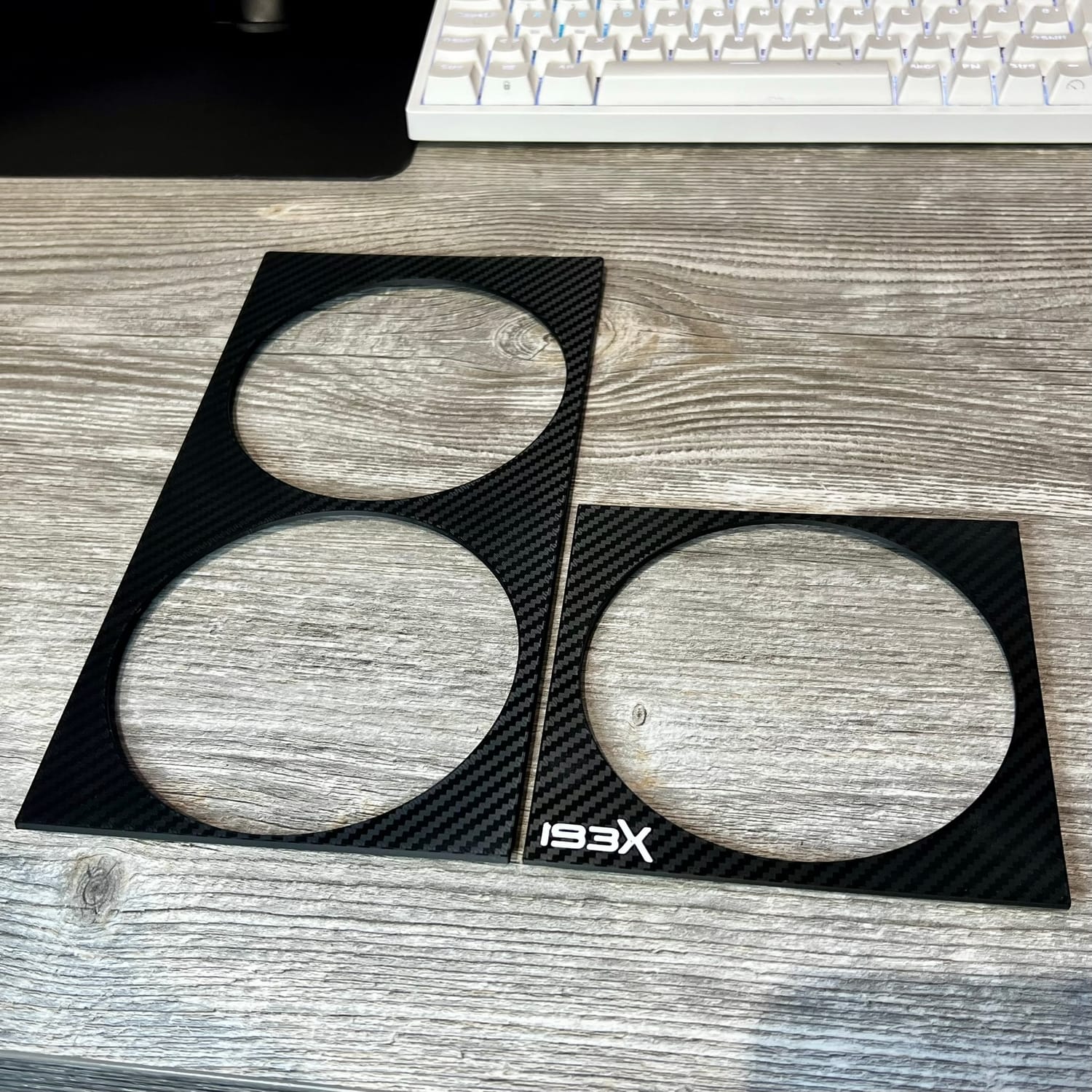 Side fan cover, display copy in black, split into the two pieces it prints as