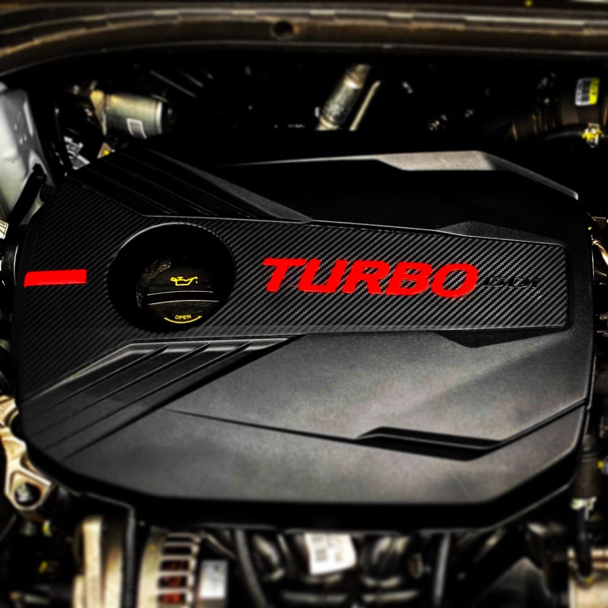 1.6 T-GDI engine of the KIA ProCeed GT with red TURBO cover