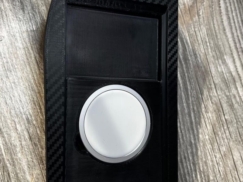 The finished insert with the M logo, the MagSafe charger and the cable