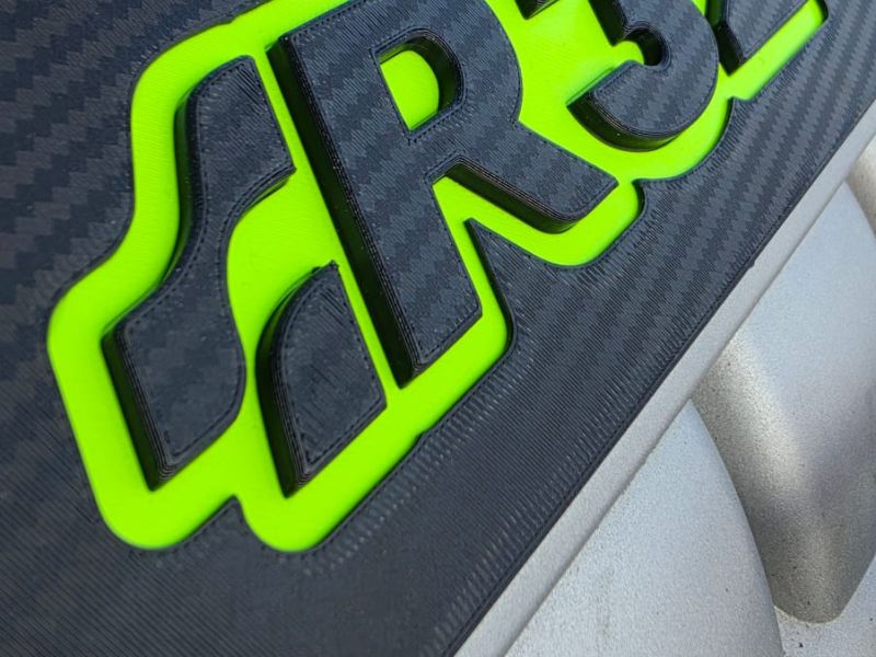 Close-up of the green R32 logo