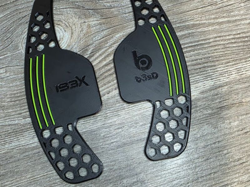 Back of the paddle shifters with the IBEX and b3sD logos and neon green stripes
