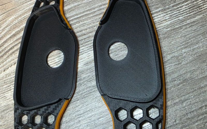 3D-printed honeycomb paddle shifters in black and orange for the KIA ProCeed GT