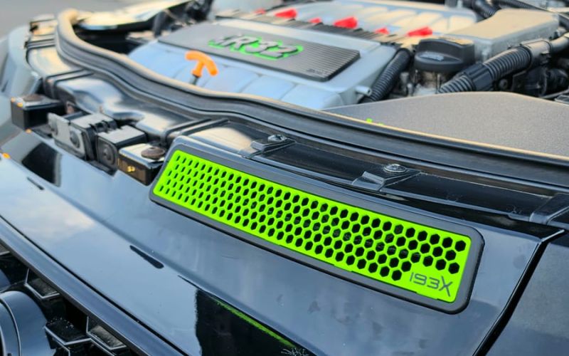 Neon green 3D-printed honeycomb intake above the grille of the Audi TT
