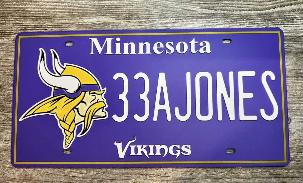 Printed Minnesota license plate reading 33AJONES