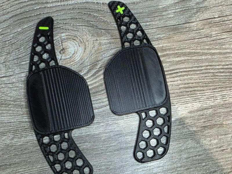 Front of both paddle shifters with the ribbed grip pads