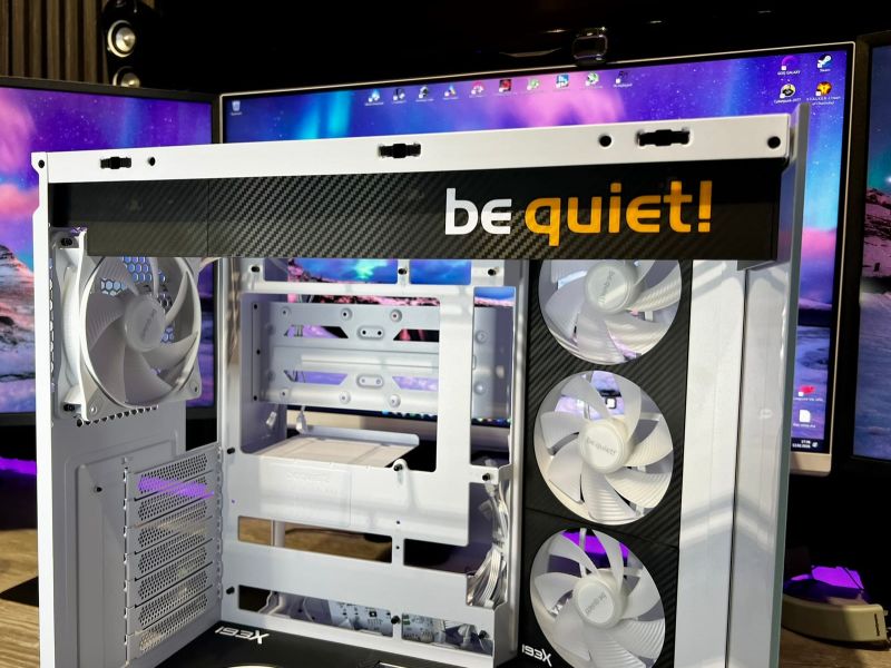 Front view of the case with the be quiet! radiator cover and the side fans