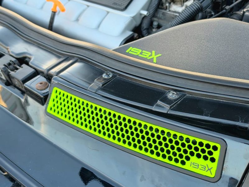 Lime insert with the engine bay behind it