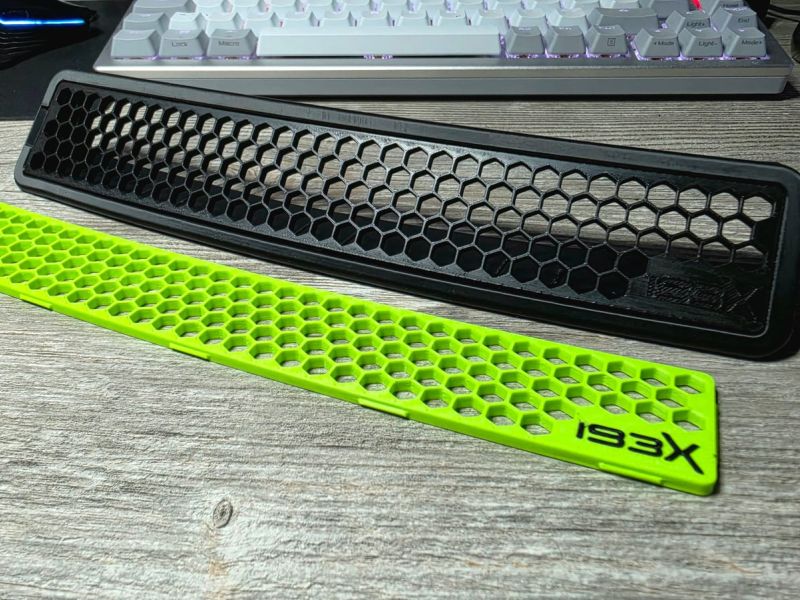 Close-up of the black and lime honeycomb mesh