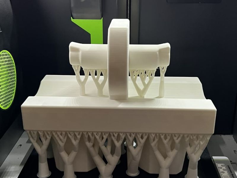 The white hip piece printing on its supports