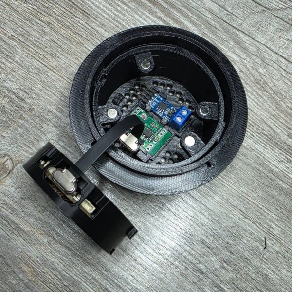 Pod opened, electronics inside, display carrier swung out