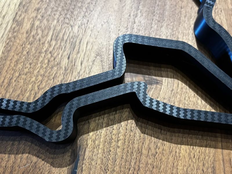 Close-up of the carbon-look surface of the printed track