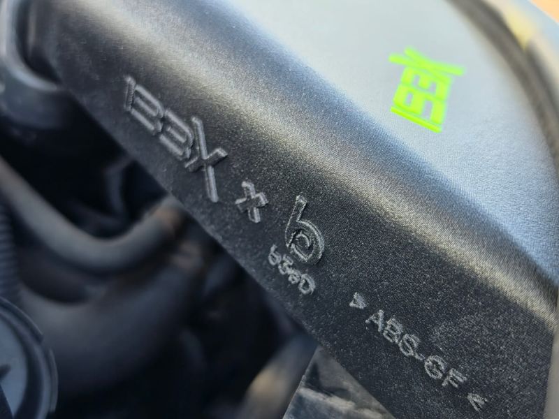 Close-up of the IBEX x b3sD lettering and the ABS-GF marking