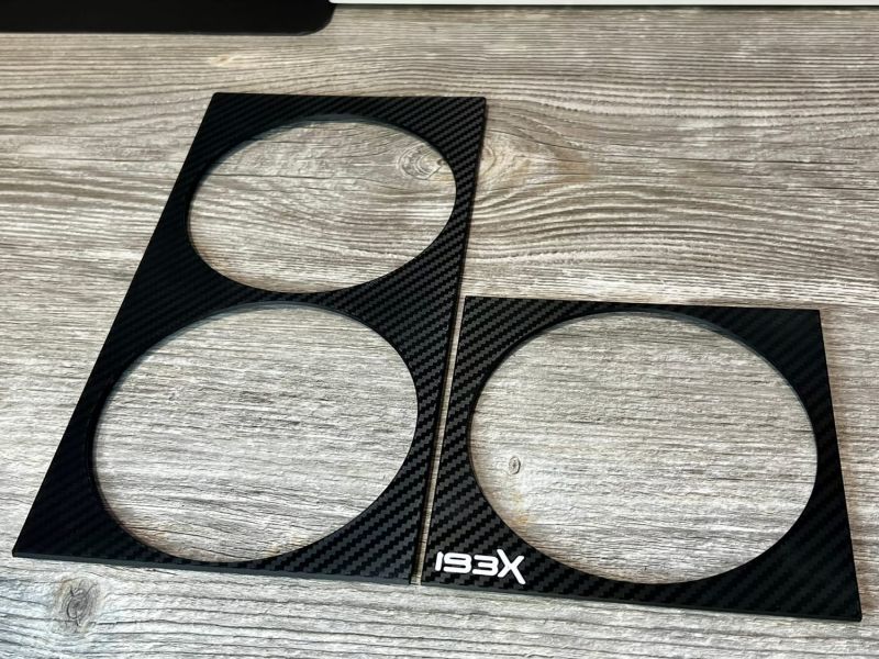 Side fan cover, display copy in black, split into the two pieces it prints as
